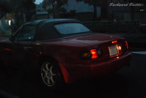 オープンカーには雨も似合う